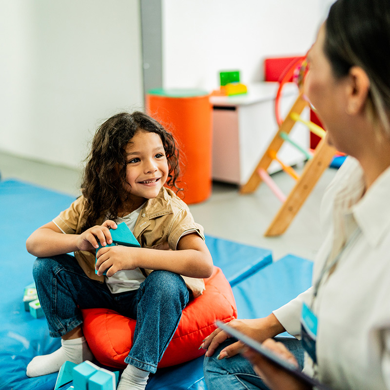Aya Education teacher and students in a classroom